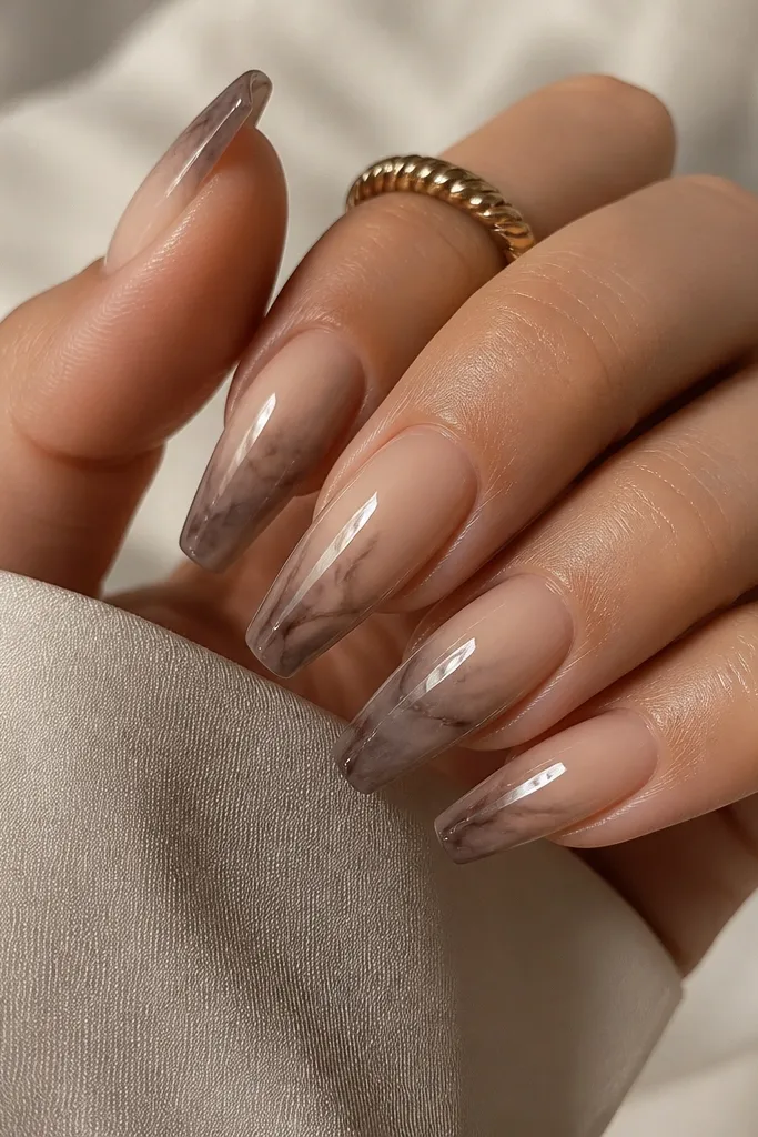 Medium coffin nails with nude base; smoky taupe fades into the sides and tip like soft smoke; glossy topcoat.
