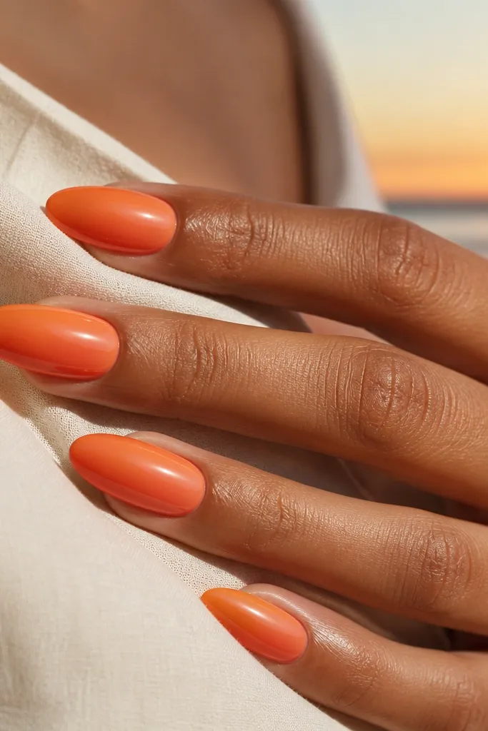 Bold orange sunset nails for a bold summer style