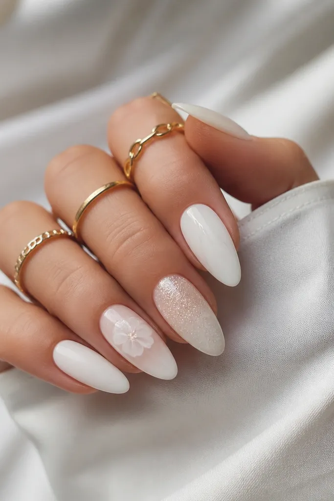 Year-round white almond nails with designs