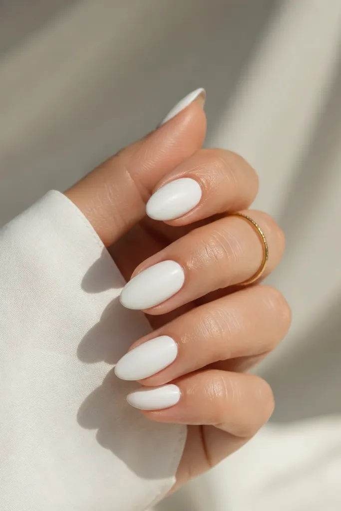 Stylish white almond shape nails